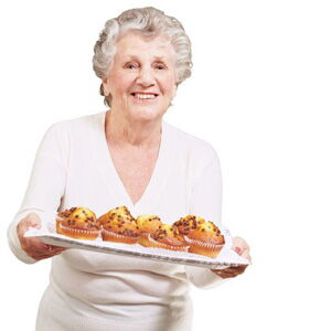 woman offering low-protein high-carb muffins