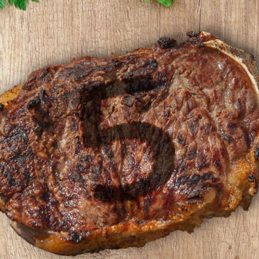 grilled meat with a branded "5"