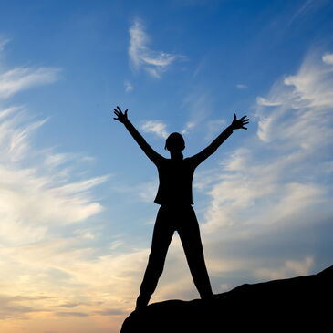 woman victorious on a ketogenic diet